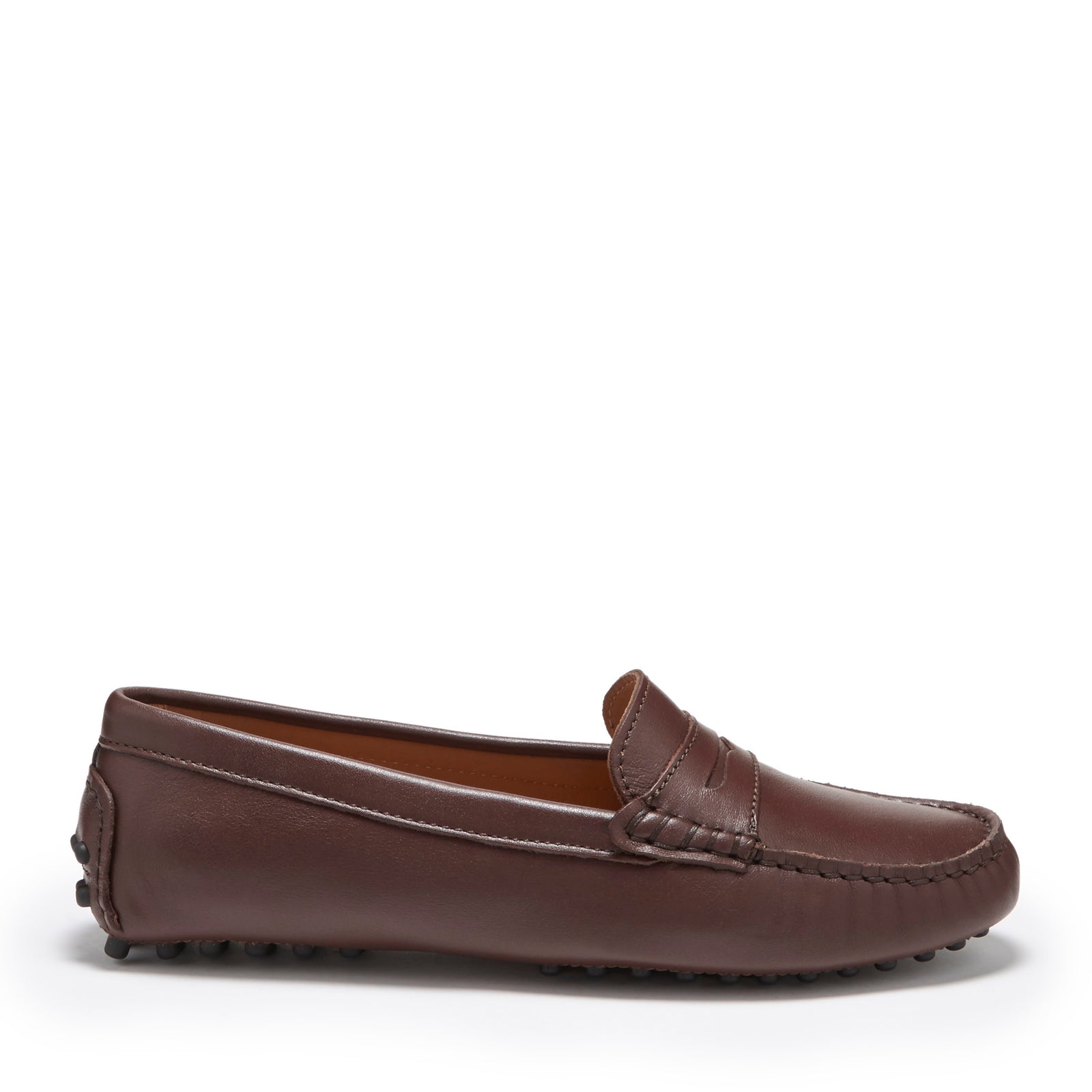 A brown leather penny loafer driving loafer shoe for women with a moccasin style.