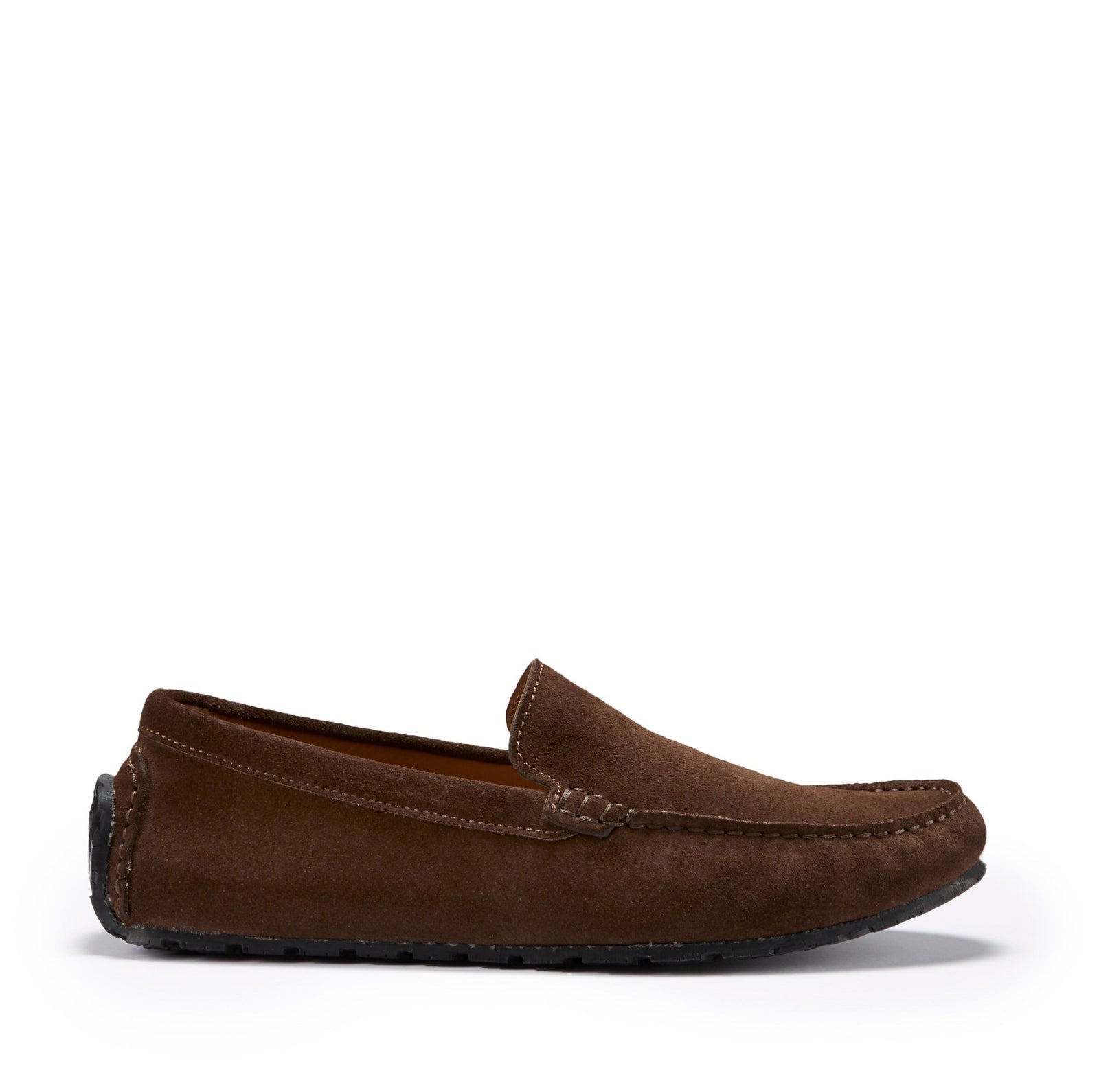 A brown suede driving loafer with a rubber sole.