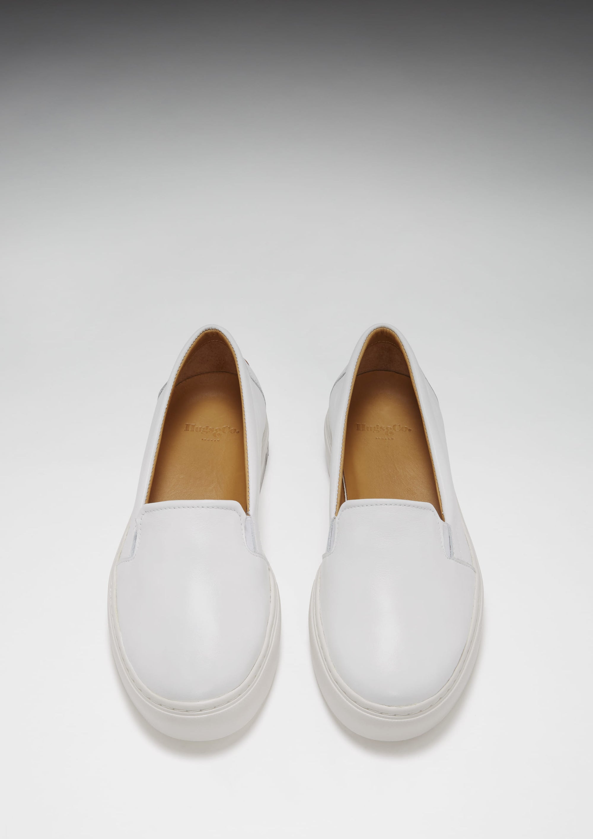 White leather slip ons on sale